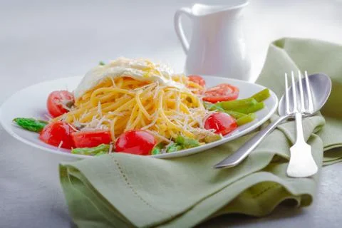 Spaghetti with egg and vegetables Stock Photos