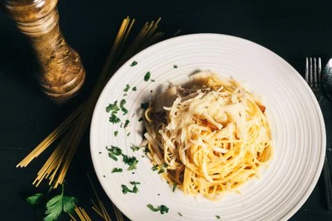 Spaghetti with egg, sour cream, parmesan and bacon. Carbonara pasta Stock Photos
