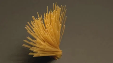 The spaghetti falls on the table. Stock Footage 137590378
