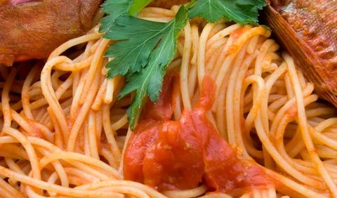 Spaghetti with fish - closeup Stock Photos