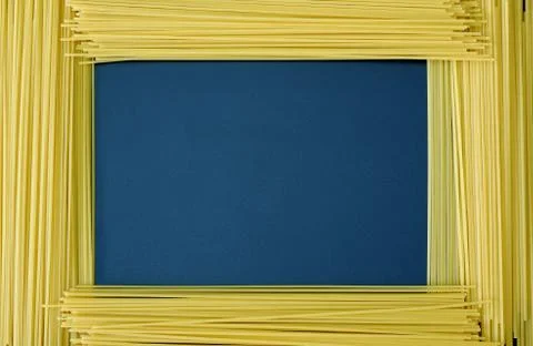 Spaghetti frame on dark blue background with free space for your text 스톡 사진
