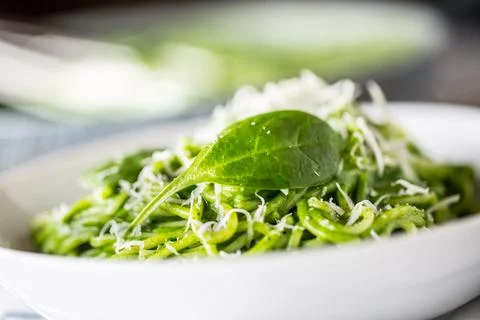 Spaghetti. Green spaghetti with spinach and parmesan. Italian and mediterra.. Stock Photos