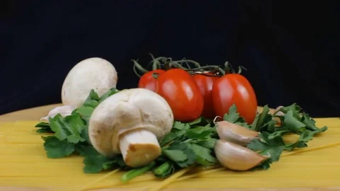 Spaghetti Ingredients with Mushrooms Rotating Stock Footage 83165357
