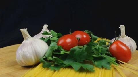 Spaghetti Ingredients Rotating on Black Stock Footage 83165203