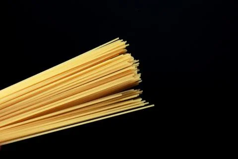 Spaghetti isolated on black background Stock Photos