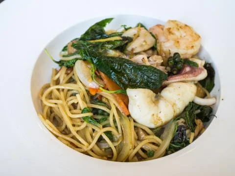 Spaghetti Kee Mao, basil and chill dried with spaghetti Stock Photos