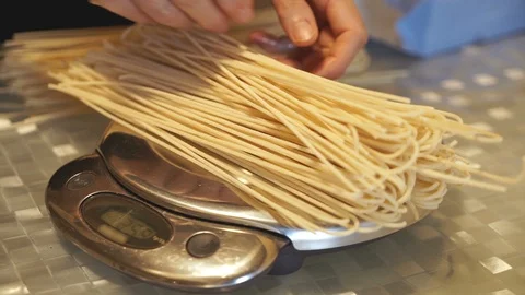 Spaghetti on Kitchen Scales Video stock 99246978
