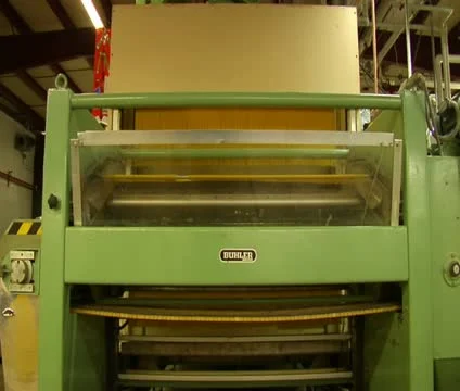 Spaghetti making machine cuts pasta Stock Footage 21595085