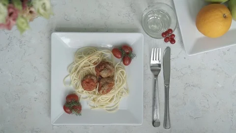 Spaghetti with meatballs on a plate Stock Footage 98786074