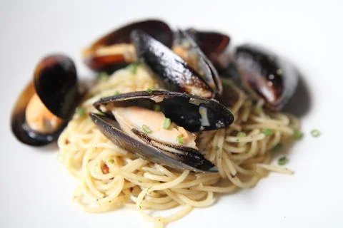 Spaghetti with mussels Stock Photos