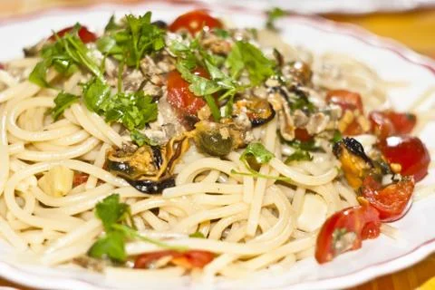 Spaghetti with mussels Stock Photos