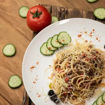 Spaghetti or pasta, Simple rustic food. Hearty lunch. Serving plate of Italian Stock Photos
