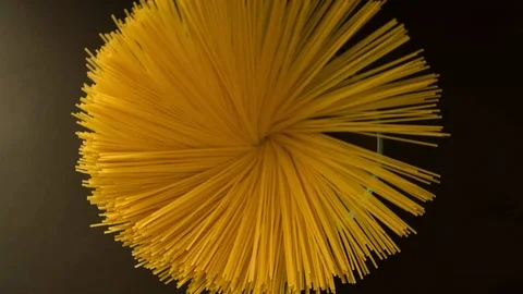 Spaghetti in pan as circle shape Top view Slow motion Stock Footage 104063481
