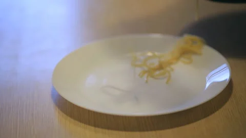 Spaghetti pasta in a dish isolated Stock Footage 98899121