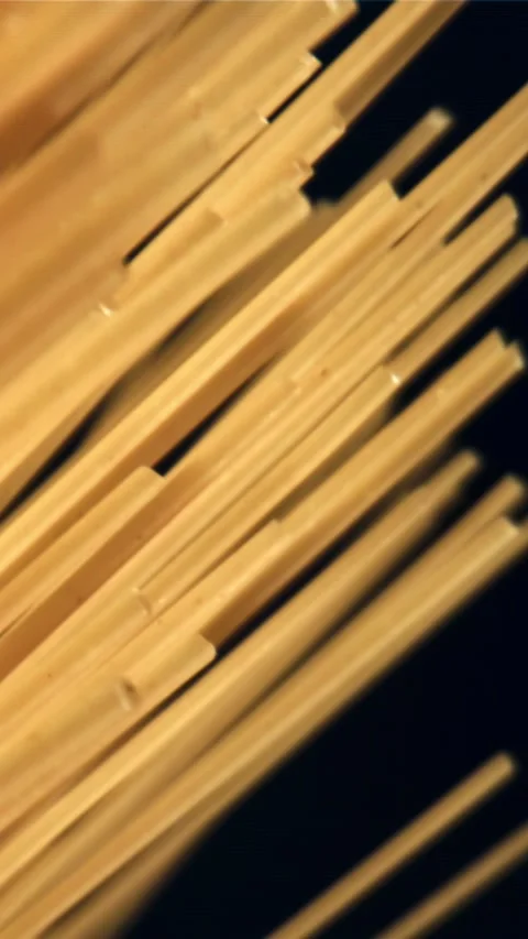 Spaghetti pasta falls down. Filmed on a high-speed camera at 1000 fps Stock Footage 335360533