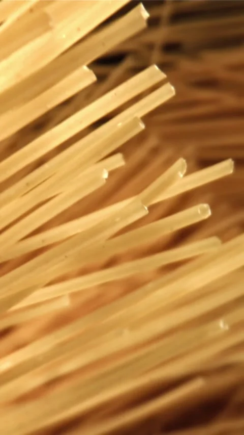 Spaghetti pasta falls down. Filmed on a high-speed camera at 1000 fps Stock Footage 335362065