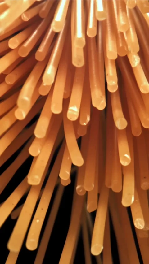 Spaghetti pasta flies up and falls down. Filmed on a high-speed camera at 1000 Stock Footage 335360028