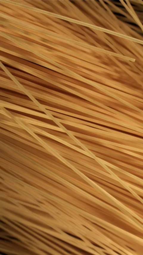 Spaghetti pasta flies up and falls down. Filmed on a high-speed camera at 1000 Stock Footage 335360383