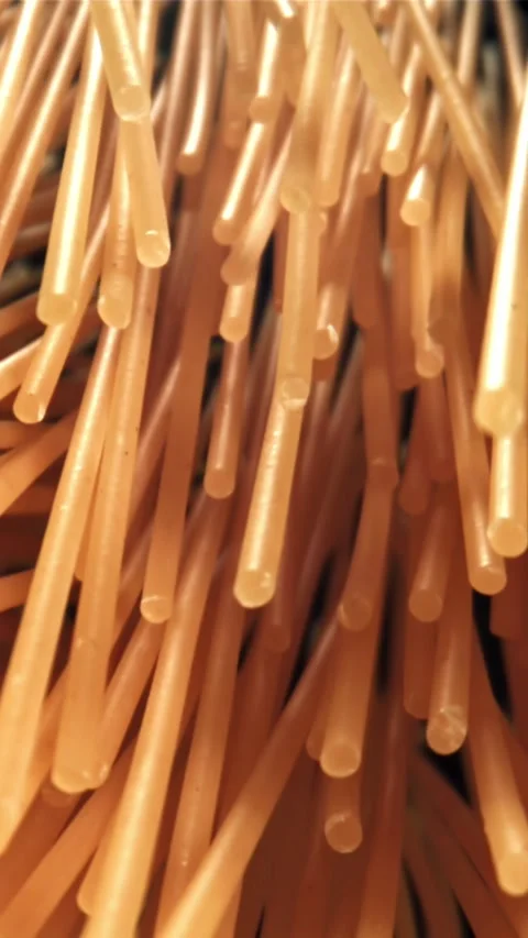 Spaghetti pasta flies up and falls down. Filmed on a high-speed camera at 1000 Stock Footage 335360517