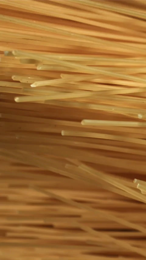 Spaghetti pasta flies up and falls down. Filmed on a high-speed camera at 1000 Stock Footage 335361167