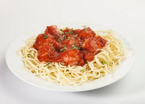 Spaghetti pasta with meatballs and tomato sauce Stock Photos