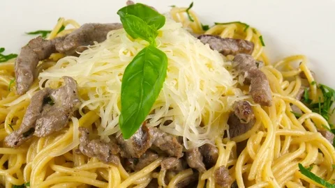 Spaghetti Pasta with roasted meat and cheese Stock Footage 78233893
