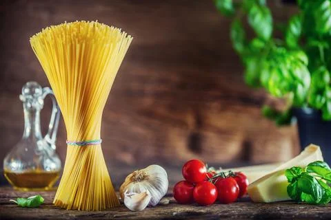 Spaghetti. Pasta spaghetti with basil garlic tomatoes cheese parmesan and o.. Stock Photos