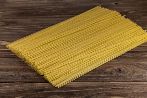 Spaghetti pasta on stone table Stock Photos