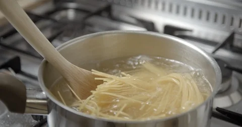 Spaghetti pastas cooking slow motion 4K Видео 103494035
