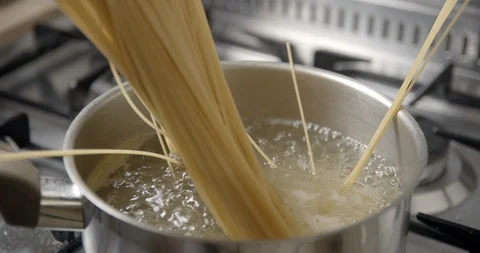 Spaghetti pastas cooking slow motion 4K Stock Footage 103494482