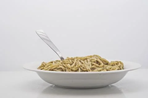 Spaghetti with pesto Stock Photos