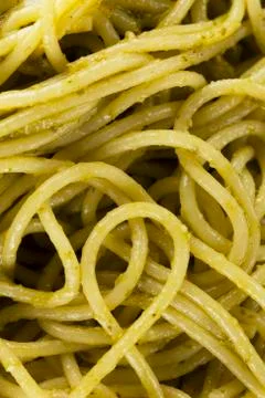 Spaghetti with pesto Stock Photos