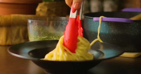 Spaghetti with pesto sauce Stock Footage 237434119