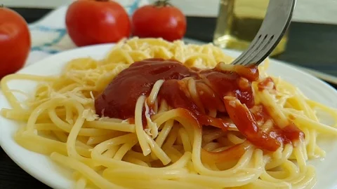 Spaghetti plate cheese, ketchup fork, slow-motion shot Stock Footage 88632826