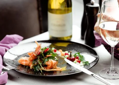 Spaghetti with prawns in the plate Stock Photos