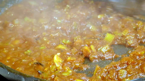 Spaghetti red sauce frying in a pan. Celery stalks, onions, garlic tomato paste. Stock Footage 277451806
