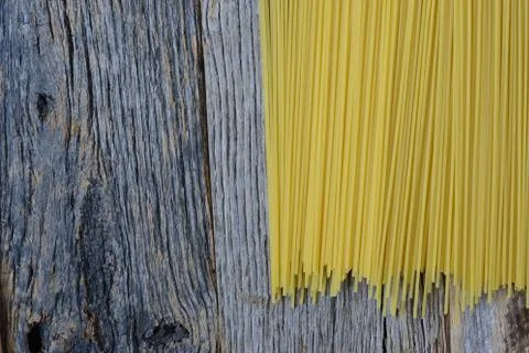 Spaghetti on rustic wood background Stock Photos