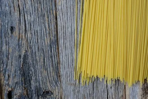Spaghetti on rustic wood background Stock Photos