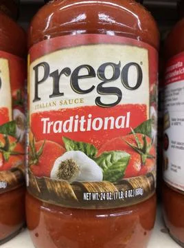 Spaghetti sauce on a grocery retail store shelf Prego traditional Stock Photos