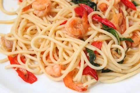 Spaghetti seafood with basil Stock Photos