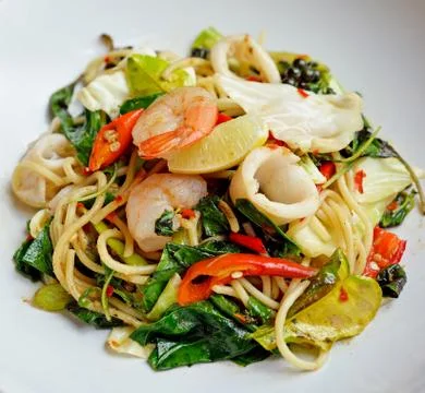 Spaghetti seafood with chilli &amp; basil Stock Photos