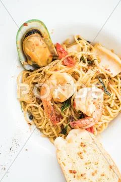 Spaghetti seafood in white plate Stock Photos