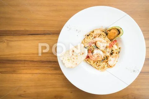 Spaghetti seafood in white plate Stock Photos