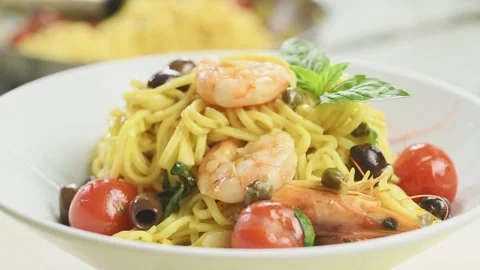 Spaghetti with shrimp and cherry tomatoes. Stock Footage 168146777