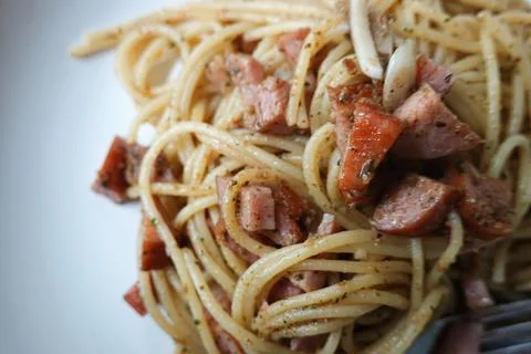 Spaghetti Spaghetti Aglio e Olio, Spaghetti with olive oil and Ham Stock Photos