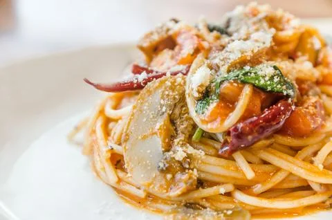 Spaghetti spicy with basil Stock Photos