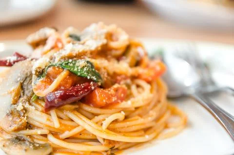 Spaghetti spicy with basil Stock Photos