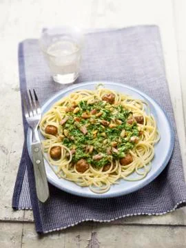 Spaghetti with spinach Stock Photos