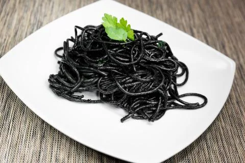 Spaghetti with squid ink Stock Photos
