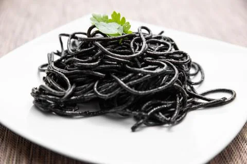 Spaghetti with squid ink Stock Photos